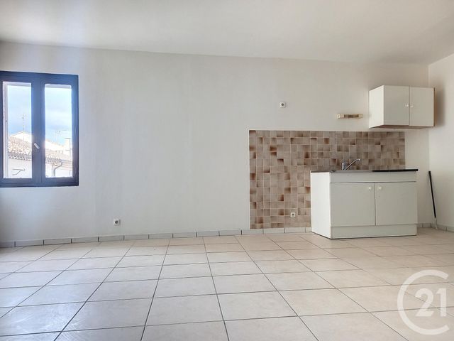 Appartement à louer - 2 pièces - 40.9 m2 - MARAUSSAN - 34 - LANGUEDOC-ROUSSILLON - Century 21 Comminges Immobilier